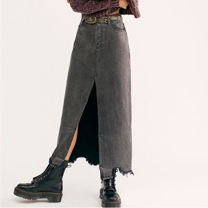 New with tags denim maxi skirt with slit and fringed hemline in color “Carbon”